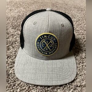 Gray and Black Tin Cup Mountain Whiskey Snap Back Hat